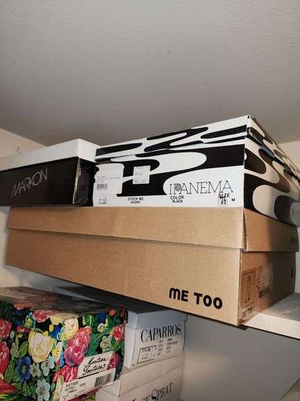 Two shelves clean off shoes and Christmas decorations