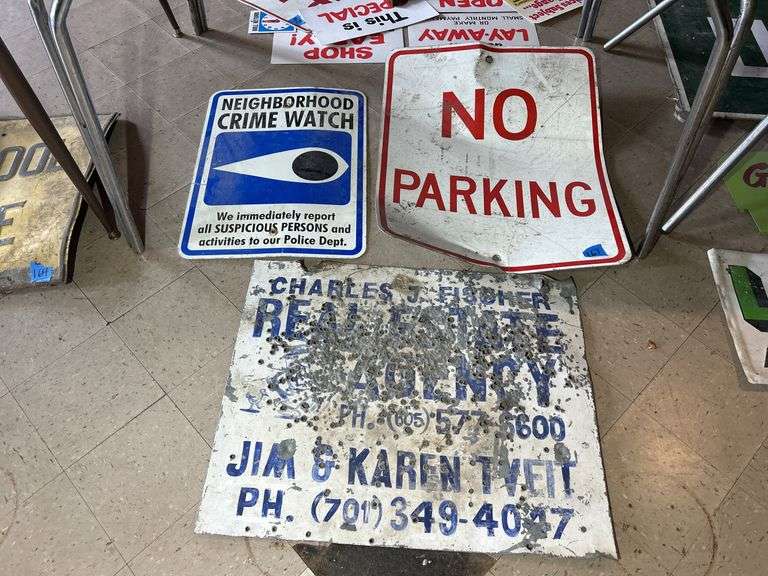 Neighborhood Watch, No Parking, & Shot Up Real Estate Sign