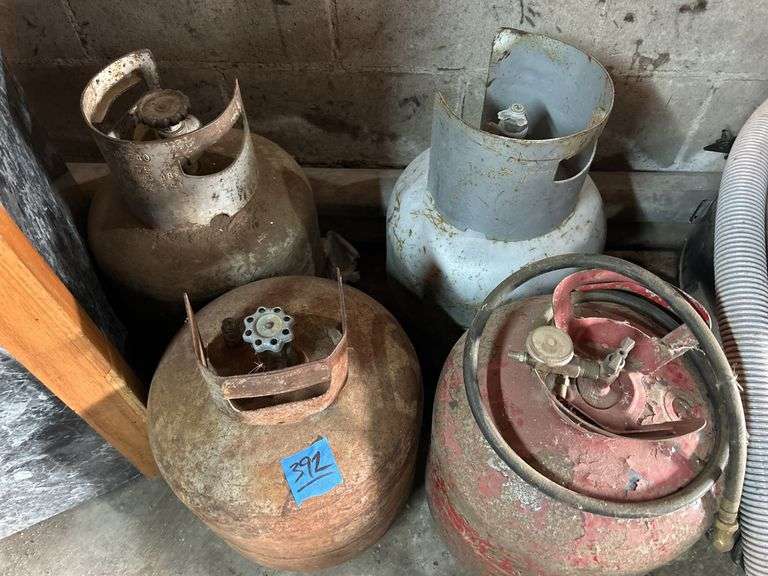 Three Propane Tanks & Air Tank
