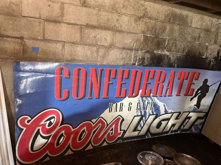 Metal Sign from The Confederate Bar & Cafe Right Here in Sunny McClusky, North Dakota
