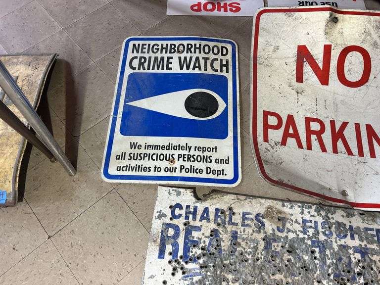 Neighborhood Watch, No Parking, & Shot Up Real Estate Sign