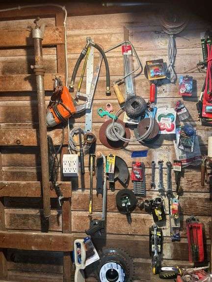 Items Hanging on the Wall - Tools, Battery Cables, Corded Drill, Barrel Pump, Saw Blades, & More