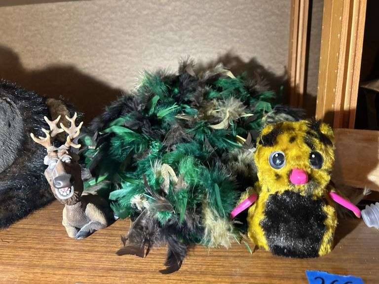 Talking Bear Rug, Camouflage Feather Boas, & a Hatchimal