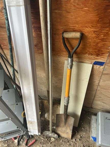 Contents of Items in the Corner - Spades, Jumper Cables, Metal Rack, TV Mount, & More