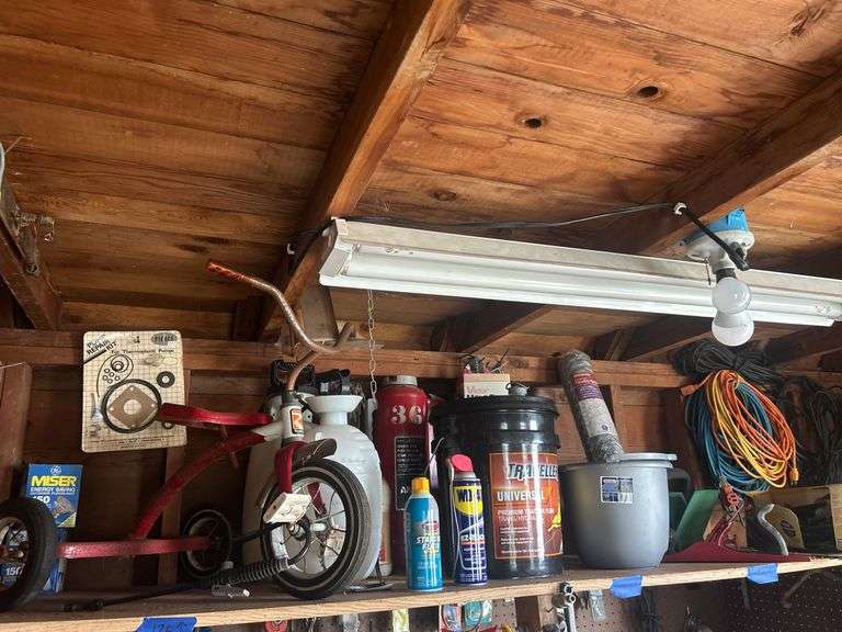 Contents of Shelf - Roadmaster Tricycle, Yard Sprayers, WD-40, Wood Plane, Poultry Netting, & More