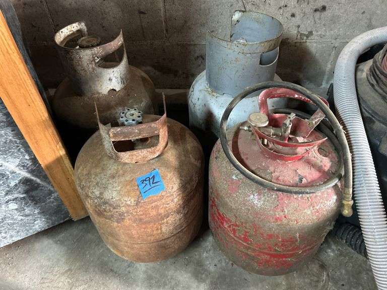 Three Propane Tanks & Air Tank