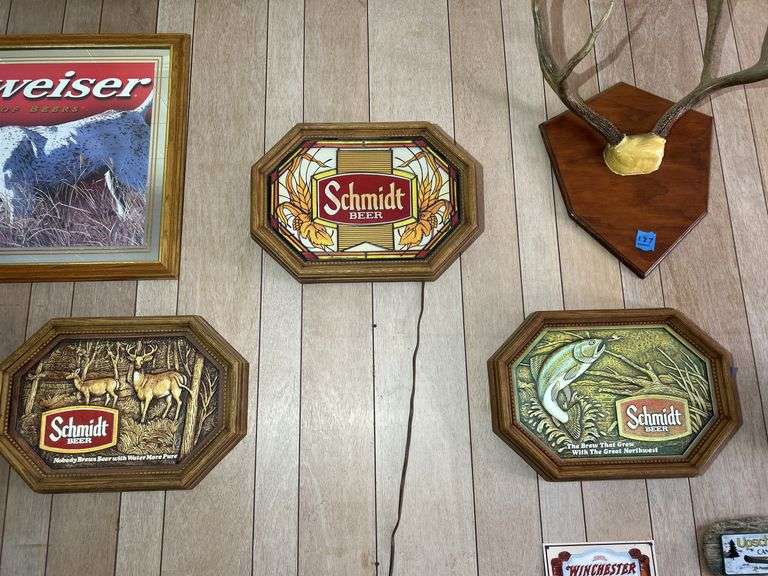Three Schmidt Beer Signs