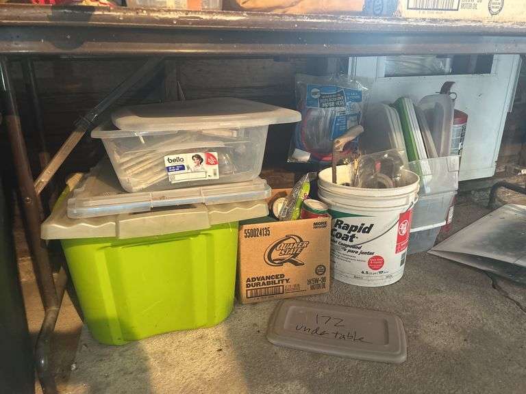 Items on the Floor - Trash Can, Bathroom Type Supplies, Shop Rags, Ajax Cleaner, & Plumbing Fittings