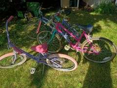 Group of Three Girls Bicycles