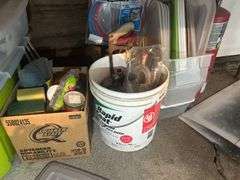 Items on the Floor - Trash Can, Bathroom Type Supplies, Shop Rags, Ajax Cleaner, & Plumbing Fittings