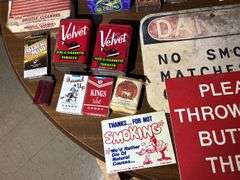 Table Top Full of Smoking & Tobacco Related Items