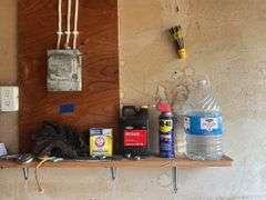 Small Group of Items on the Wall & Shelf