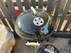 Two Weber Charcoal Grills