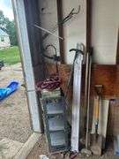 Contents of Items in the Corner - Spades, Jumper Cables, Metal Rack, TV Mount, & More