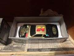 Two Shelves of Jeff Gordon Collectible Cars