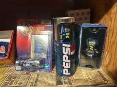 Two Shelves of Jeff Gordon Collectible Cars