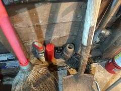 Items on The Wall - 6 Ft Level, Brooms, Dust Pans, Receiver Hitch, & More