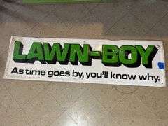 Embossed Lawn Boy Pressed Tin Sign
