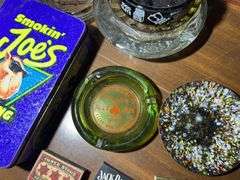 Table Top Full of Smoking & Tobacco Related Items