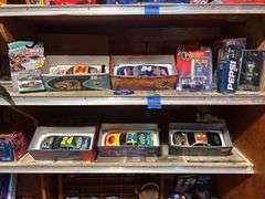 Two Shelves of Jeff Gordon Collectible Cars