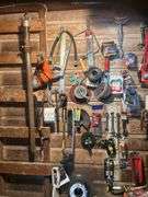 Items Hanging on the Wall - Tools, Battery Cables, Corded Drill, Barrel Pump, Saw Blades, & More