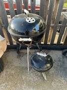 Two Weber Charcoal Grills