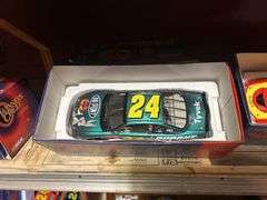 Two Shelves of Jeff Gordon Collectible Cars