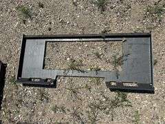 Open center skid steer plate