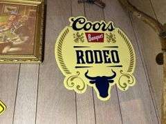 Keystone Light Framed Sign, Justin Boots Sign, Belt Buckle, Coors Banquet Beer Sign, Scythe, & More