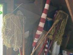 Short Footstep Ladder, Sump Pump, Hose, Brooms, & Mops