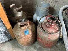 Three Propane Tanks & Air Tank