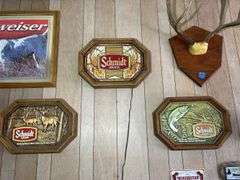 Three Schmidt Beer Signs