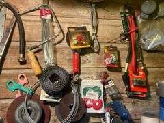 Items Hanging on the Wall - Tools, Battery Cables, Corded Drill, Barrel Pump, Saw Blades, & More