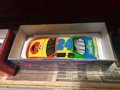 Two Shelves of Jeff Gordon Collectible Cars