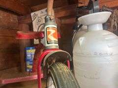 Contents of Shelf - Roadmaster Tricycle, Yard Sprayers, WD-40, Wood Plane, Poultry Netting, & More