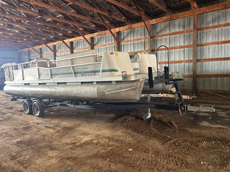 1993  Forester   2500 executive 25 foot long pontoon Boat, evinrude 130 motor with a 2 axle trailer