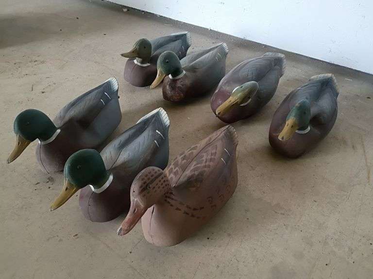 Seven rubber mallard duck decoys by Plasti-Duk