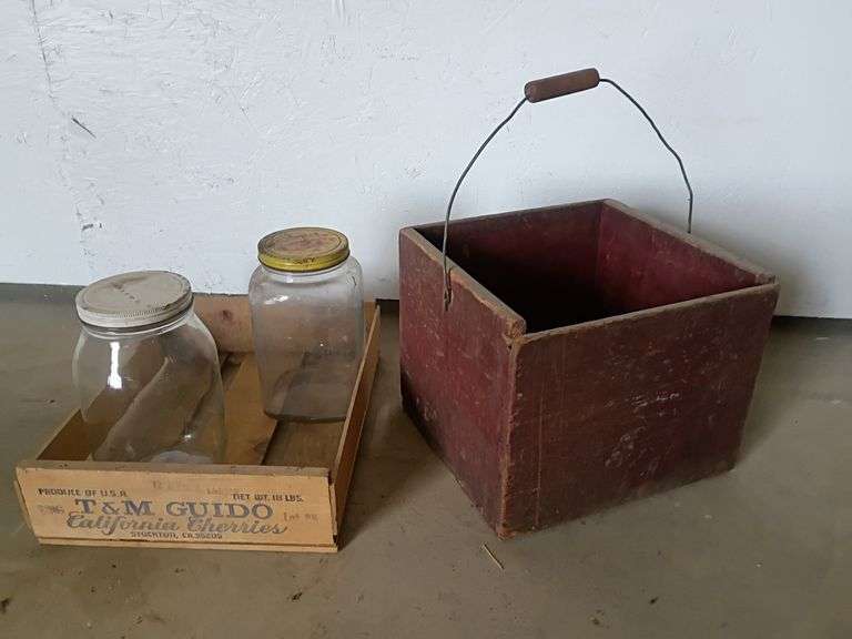Egg box, cherry crate, two 1 gallon glass jars