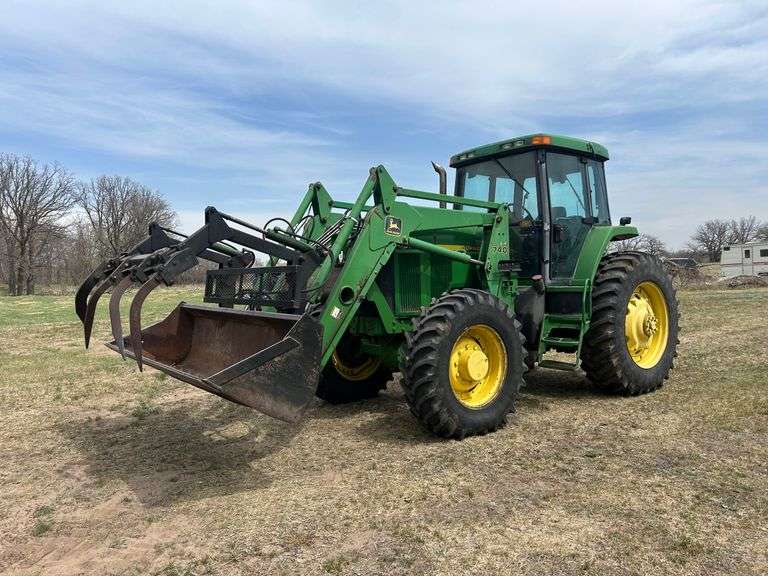 1997  John Deere  7610 MFWD Tractor with JD 740 Self-Leveling Loader