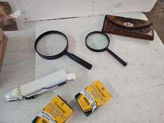 MAGNIFYING GLASSES, WALLET, CHALK, POSTCARDS, WIND CHINE, HANDS, ETC.