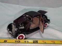 1933 FORD DELUXE COUPE DIECAST CAR MODEL ((1) HEADLIGHT NEEDS REPAIR)