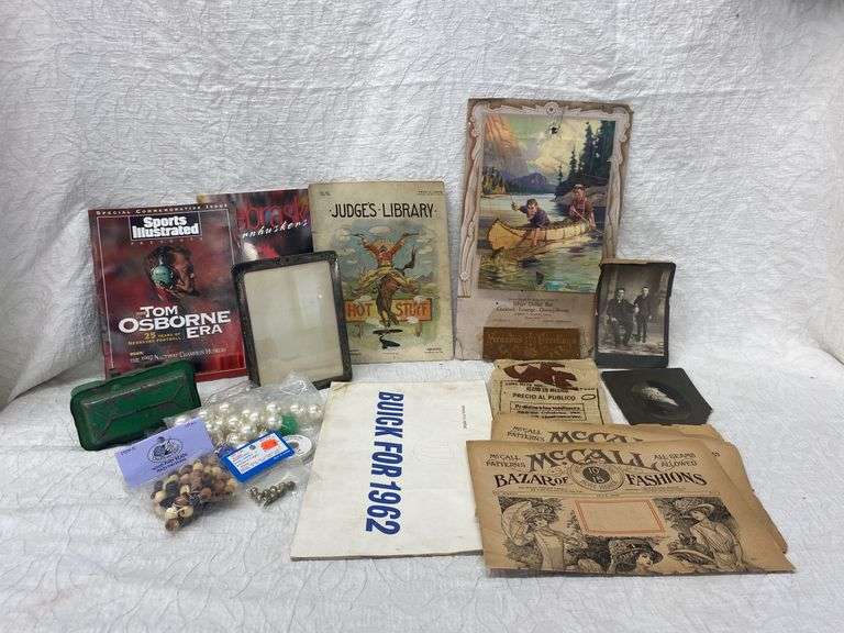 VINTAGE CALENDAR, MCALL PATTERNS, PICTURES, NEBRASKA CORNHUSKER MAGAZINES, AND ASSORTED BEADS