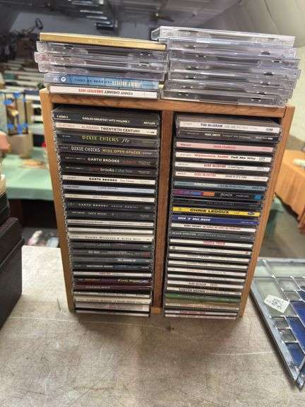 ASSORTED COUNTRY CDS AND ORGANIZER
