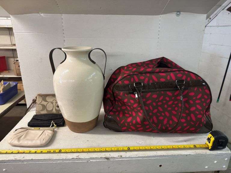 LOT WITH ASSORTED HANDBAGS, VASE, AND SUITCASE