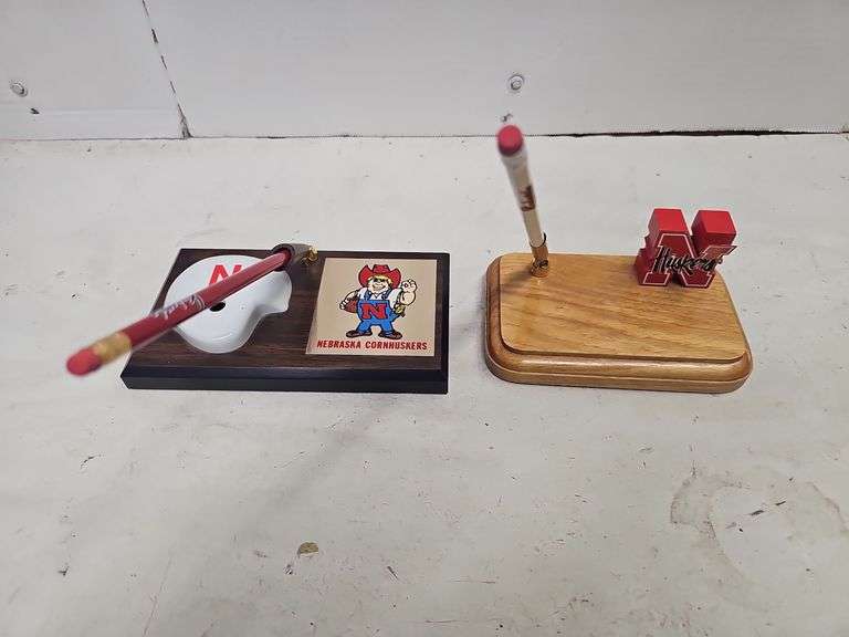 PAIR OF HUSKER DESKTOP PEN HOLDERS