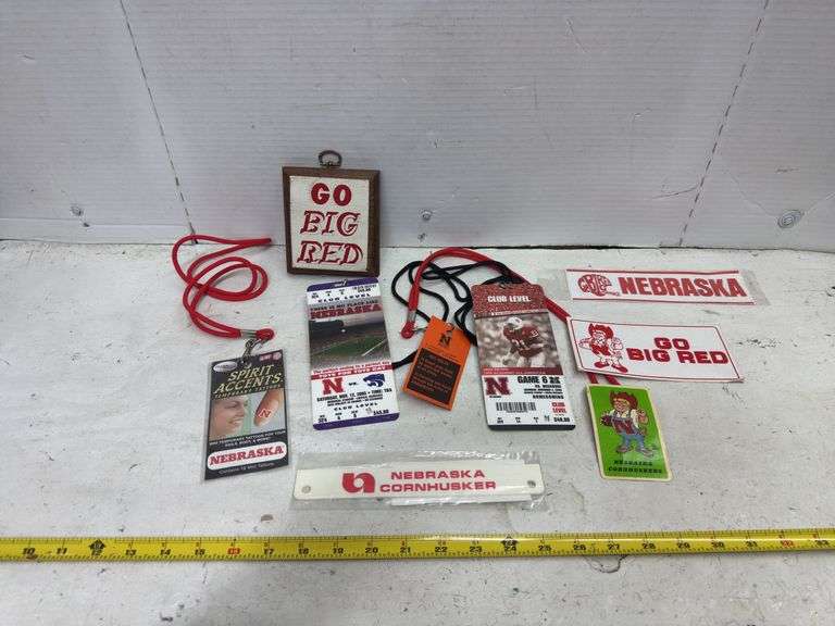 ASSORTED HUSKER GAME PASSES AND STICKERS