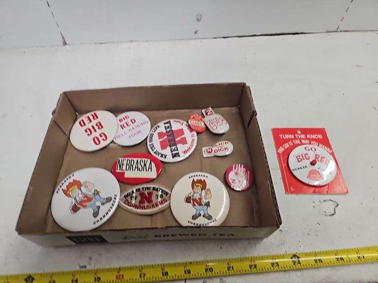 ASSORTED HUSKER BUTTONS, PATCH & FINGER CLACKERS