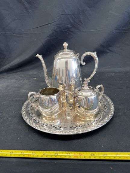 SILVER PLATE TEAPOT, CREAMER, SUGAR, AND SERVING PLATE