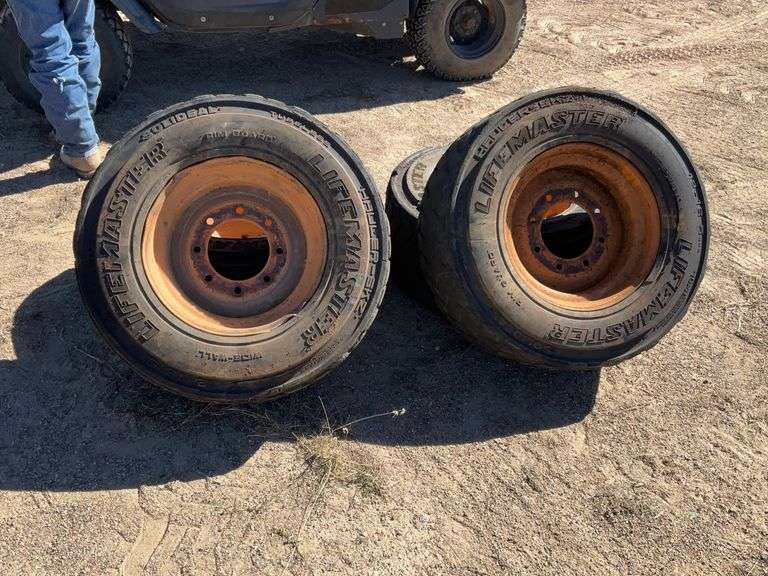 Skid steer wheels J&J Auctioneers LLC