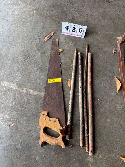 Saw and Metal Pieces